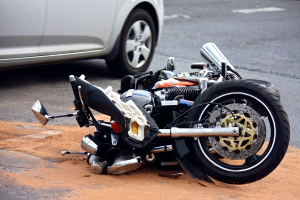 motorcycle crashed by car