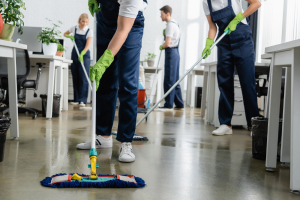 employee moping the floor