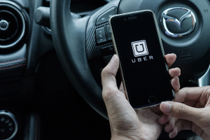 uber driver holding phone
